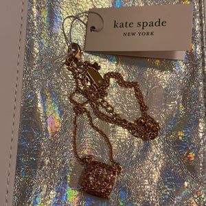 Kate Spade ♠️ cause a stir rose gold necklace